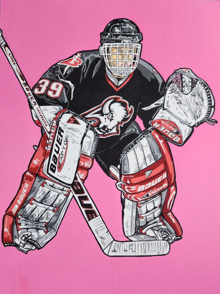 Dominik Hasek preparing to make a save while playing for the Buffalo Sabres